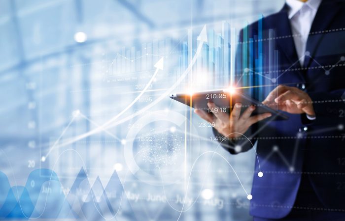 Kuvituskuva, mieshenkilö tablettilaite kädessään.